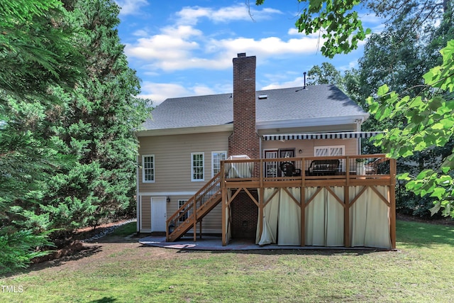 111 Ferncroft Ct, Cary, NC 27519 - back of house featuring stairs, a deck, a shingled roof, a chimney, and a lawn