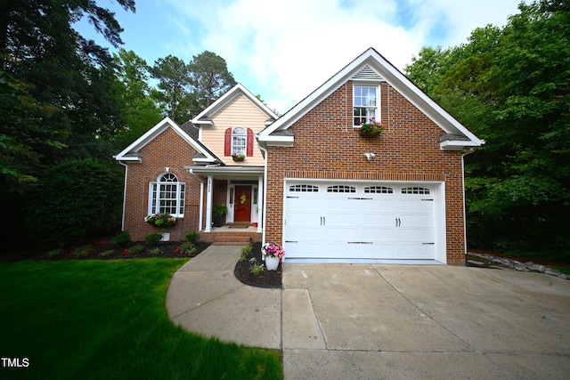 111 Ferncroft Ct, Cary, NC 27519 - traditional home featuring brick siding, driveway, a garage, and a front yard