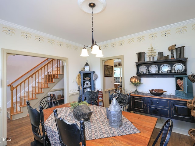 dining area featuring stairway, wood finished floors, and ornamental molding