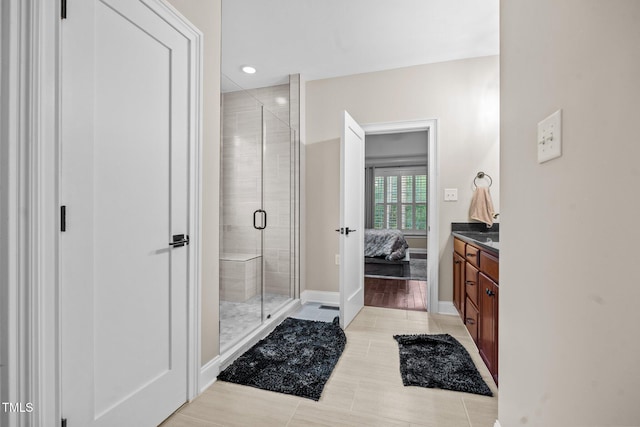 200 Heather Brook Cir, Spring Lake, NC 28390 - full bath featuring vanity, baseboards, connected bathroom, french doors, and a stall shower