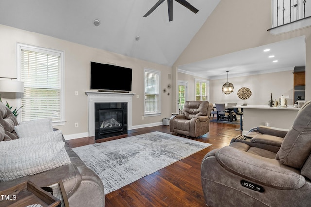 200 Heather Brook Cir, Spring Lake, NC 28390 - living room with a fireplace with flush hearth, baseboards, high vaulted ceiling, a ceiling fan, and dark wood finished floors