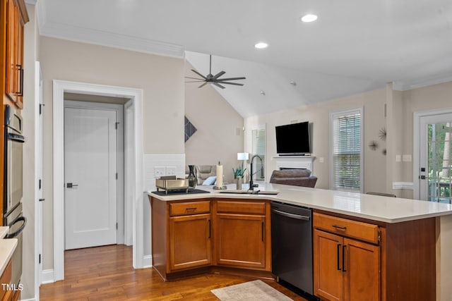 200 Heather Brook Cir, Spring Lake, NC 28390 - kitchen featuring stainless steel dishwasher, a ceiling fan, dark wood-style flooring, open floor plan, and a sink