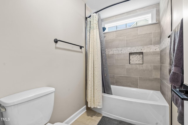 200 Heather Brook Cir, Spring Lake, NC 28390 - bathroom with toilet, tile patterned floors, shower / bathtub combination with curtain, and baseboards