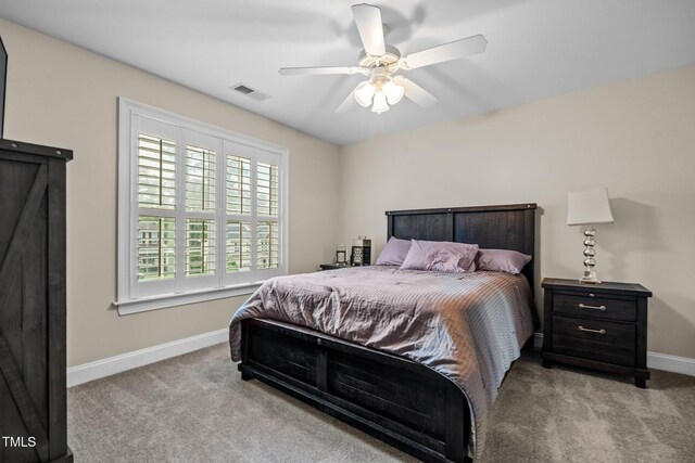 200 Heather Brook Cir, Spring Lake, NC 28390 - bedroom with visible vents, carpet flooring, baseboards, and ceiling fan