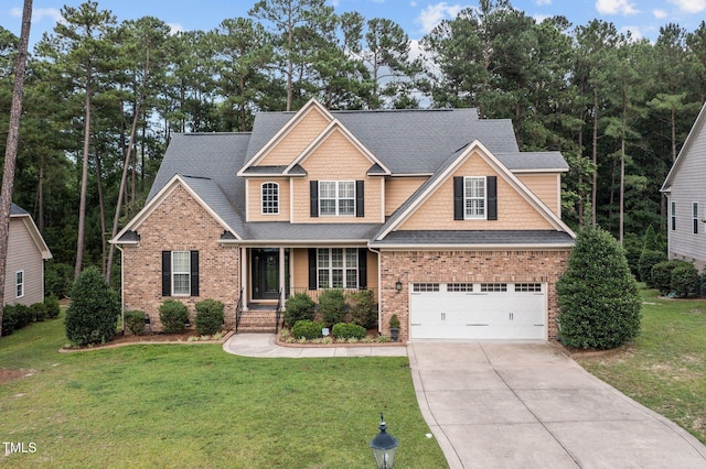 200 Heather Brook Cir, Spring Lake, NC 28390 - craftsman-style home with brick siding, driveway, a front lawn, and a garage