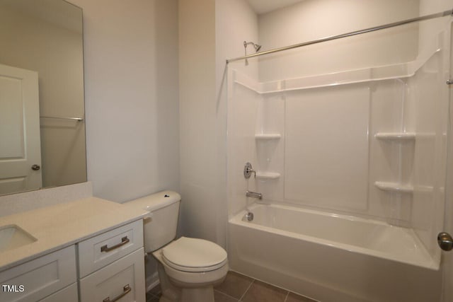 bathroom with tile patterned floors, vanity, toilet, and tub / shower combination