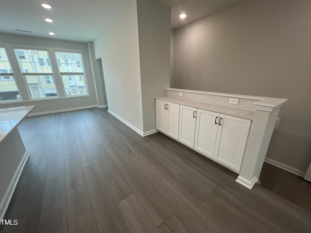 2723 Hunter Woods Dr # 566, Apex, NC 27502 - unfurnished dining area featuring dark wood-style floors and recessed lighting