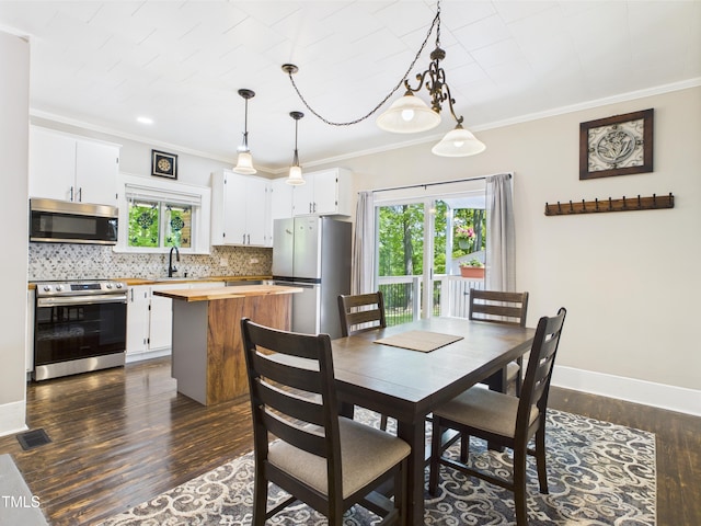3609 Creekridge Country Rd, Randleman, NC 27317 - dining space with baseboards, ornamental molding, dark wood-style floors, and visible vents