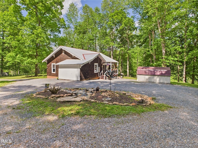 3609 Creekridge Country Rd, Randleman, NC 27317 - view of home's exterior with driveway and an outbuilding