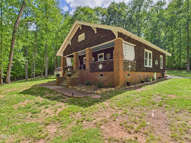 3609 Creekridge Country Rd, Randleman, NC 27317 - view of front facade with covered porch, a front lawn, and brick siding