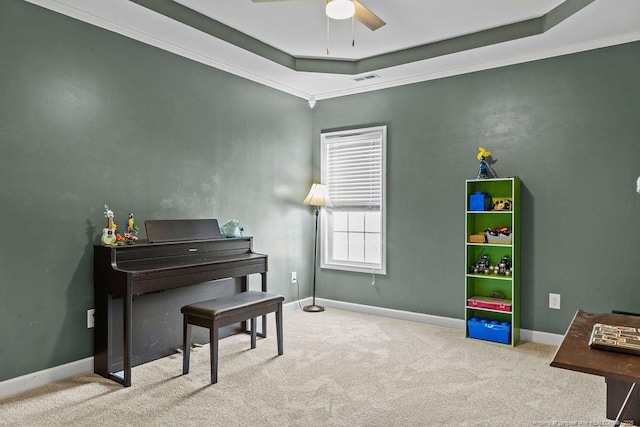 6628 Carriage Crossing Rd, Hope Mills, NC 28348 - sitting room with visible vents, baseboards, ceiling fan, a tray ceiling, and carpet