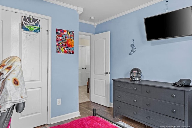 6628 Carriage Crossing Rd, Hope Mills, NC 28348 - bedroom featuring crown molding, baseboards, and wood finished floors