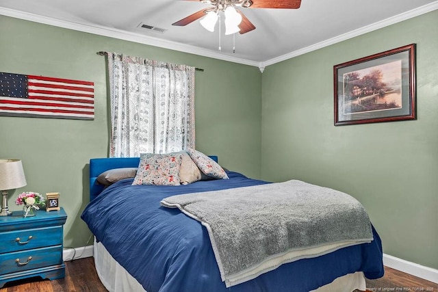 6628 Carriage Crossing Rd, Hope Mills, NC 28348 - bedroom with a ceiling fan, visible vents, crown molding, wood finished floors, and baseboards