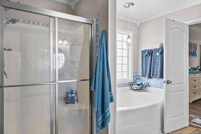 6628 Carriage Crossing Rd, Hope Mills, NC 28348 - bathroom with ornamental molding, a bath, and a shower stall