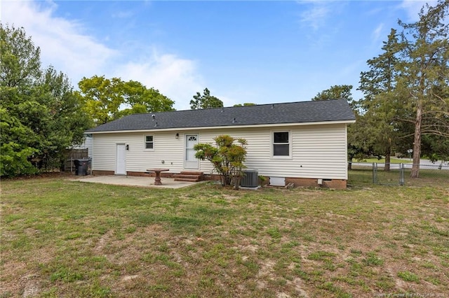 back of house with central AC, fence, a patio, entry steps, and a yard