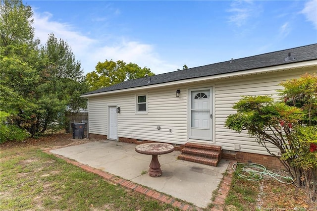 rear view of house featuring a patio, crawl space, and entry steps