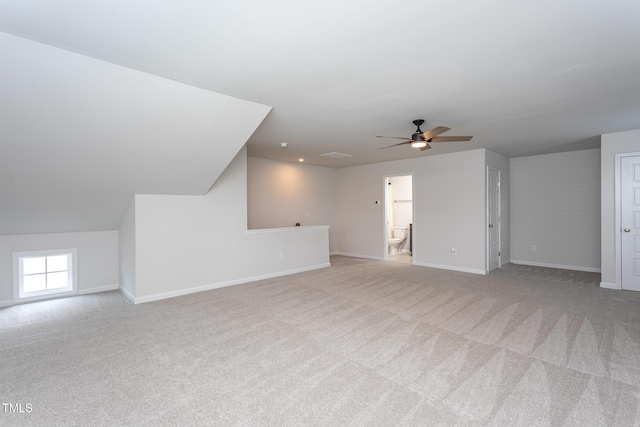 228 Shingle Oak Rd, Wake Forest, NC 27587 - unfurnished living room featuring light colored carpet, ceiling fan, and baseboards