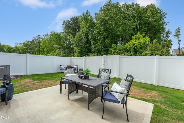 228 Shingle Oak Rd, Wake Forest, NC 27587 - view of patio / terrace featuring outdoor dining area and central AC unit
