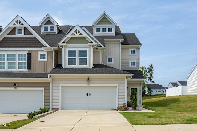 228 Shingle Oak Rd, Wake Forest, NC 27587 - view of front of property with driveway, board and batten siding, roof with shingles, and an attached garage
