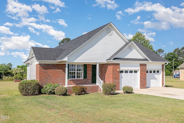 2919 Hayfield Rd, Wade, NC 28395 - view of front of home with a garage, roof with shingles, a front yard, brick siding, and driveway