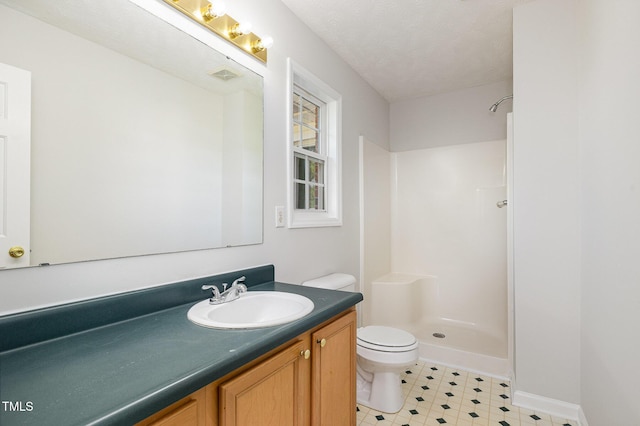 2919 Hayfield Rd, Wade, NC 28395 - full bathroom featuring toilet, a shower, vanity, and visible vents