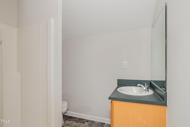2919 Hayfield Rd, Wade, NC 28395 - bathroom featuring vanity, toilet, and baseboards