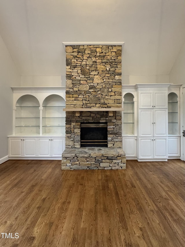 90021 Hoey, Chapel Hill, NC 27517 - unfurnished living room with a fireplace, wood finished floors, and lofted ceiling