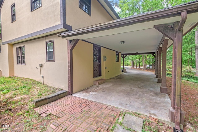 exterior space with a carport