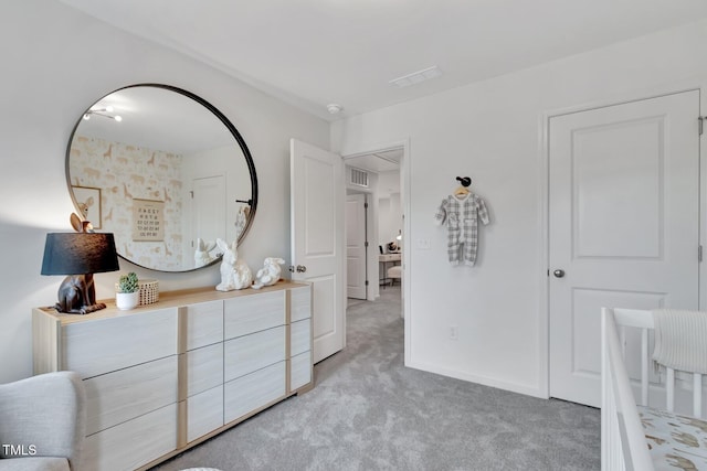 bedroom with light carpet and visible vents