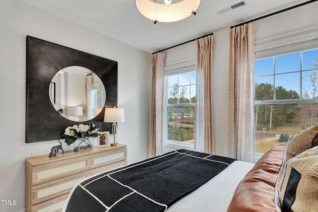 bedroom with visible vents