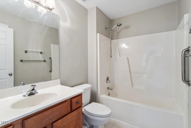 full bath with vanity, tile patterned flooring, toilet, and bathing tub / shower combination