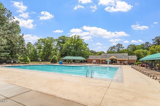 pool with a patio area