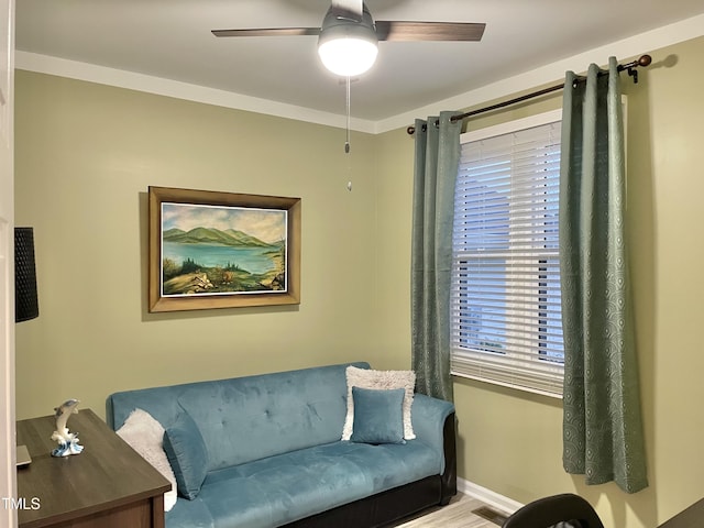 1944 Castle Pines Dr, Raleigh, NC 27604 - living room featuring a ceiling fan, baseboards, and wood finished floors