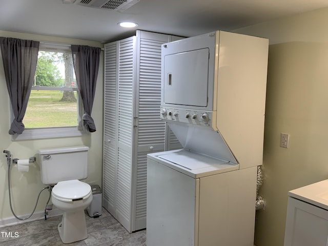 109 Revelle Park Ln, Murfreesboro, NC 27855 - washroom featuring estacked washer and dryer, baseboards, and recessed lighting