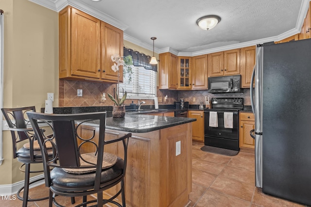 kitchen with pendant lighting, black appliances, a peninsula, glass insert cabinets, and a breakfast bar