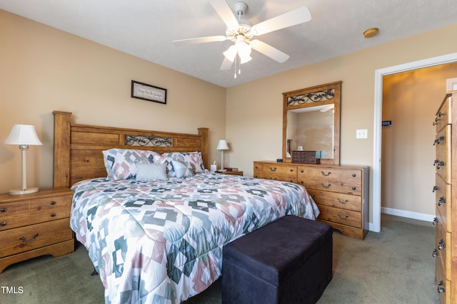 bedroom with baseboards, a ceiling fan, and carpet