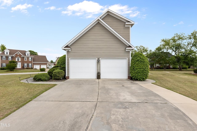 garage with concrete driveway