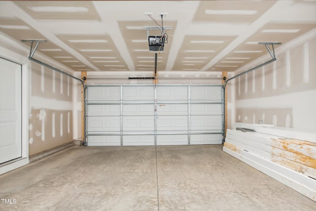 garage featuring a garage door opener