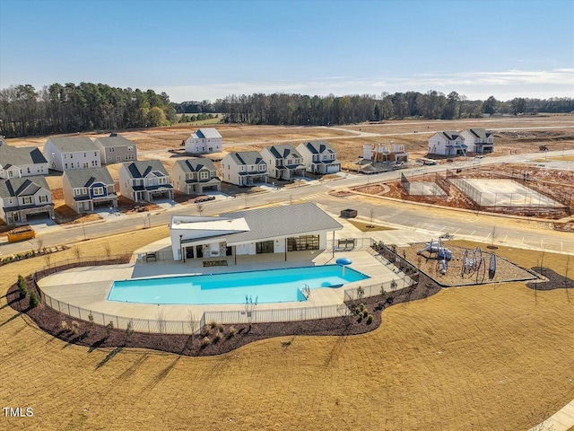 1024 Channel Drop, Zebulon, NC 27597 - pool featuring a patio area, fence, and a residential view
