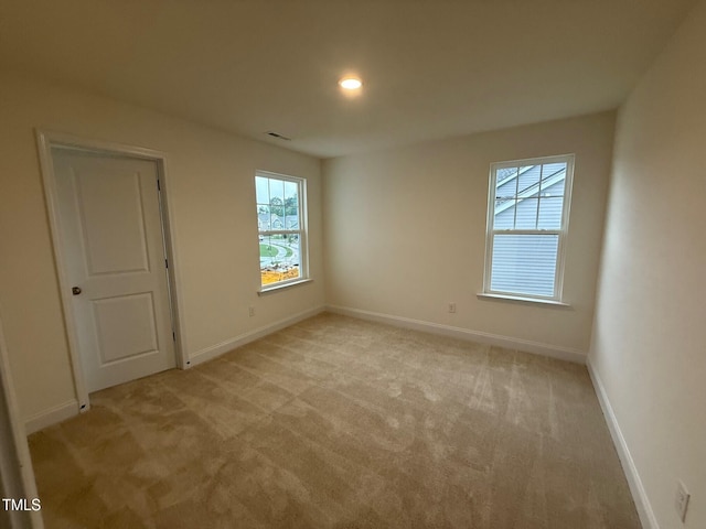 1024 Channel Drop, Zebulon, NC 27597 - unfurnished room with light colored carpet and recessed lighting
