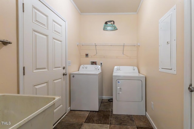 laundry room with separate washer and dryer, electric panel, ornamental molding, and baseboards