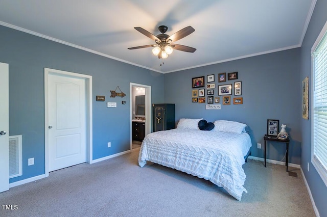 bedroom with carpet floors, baseboards, crown molding, and multiple windows