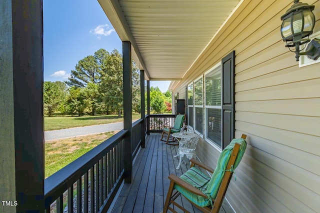 wooden deck featuring a porch
