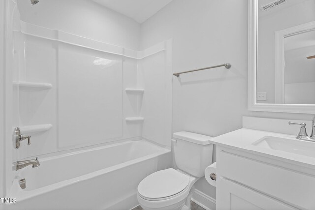 full bath featuring toilet, vanity, and washtub / shower combination
