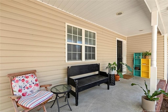 view of patio featuring a porch
