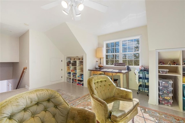 living area with ceiling fan, an upstairs landing, and built in features