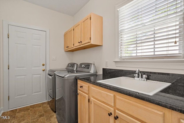 laundry room featuring washing machine and dryer and cabinet space