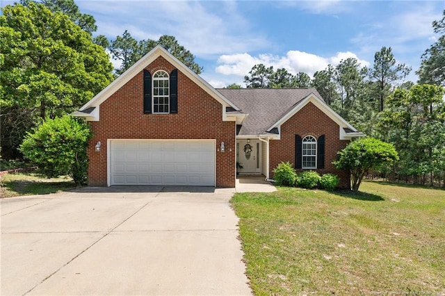 481 Clearwater Harbour, Sanford, NC 27332 - traditional home featuring a garage, driveway, a front lawn, and brick siding