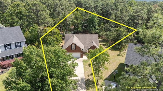 481 Clearwater Harbour, Sanford, NC 27332 - view of subject property featuring a heavily wooded area