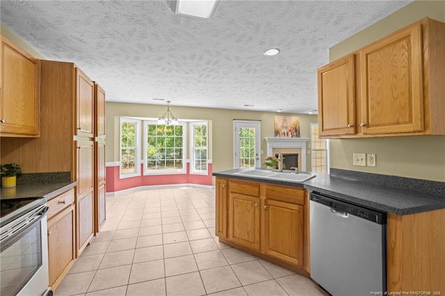 481 Clearwater Harbour, Sanford, NC 27332 - kitchen with dishwasher, a sink, range with electric cooktop, dark countertops, and light tile patterned floors